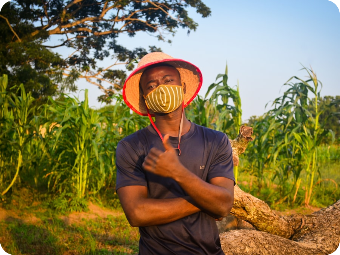 Agritech founder standing in a farm field